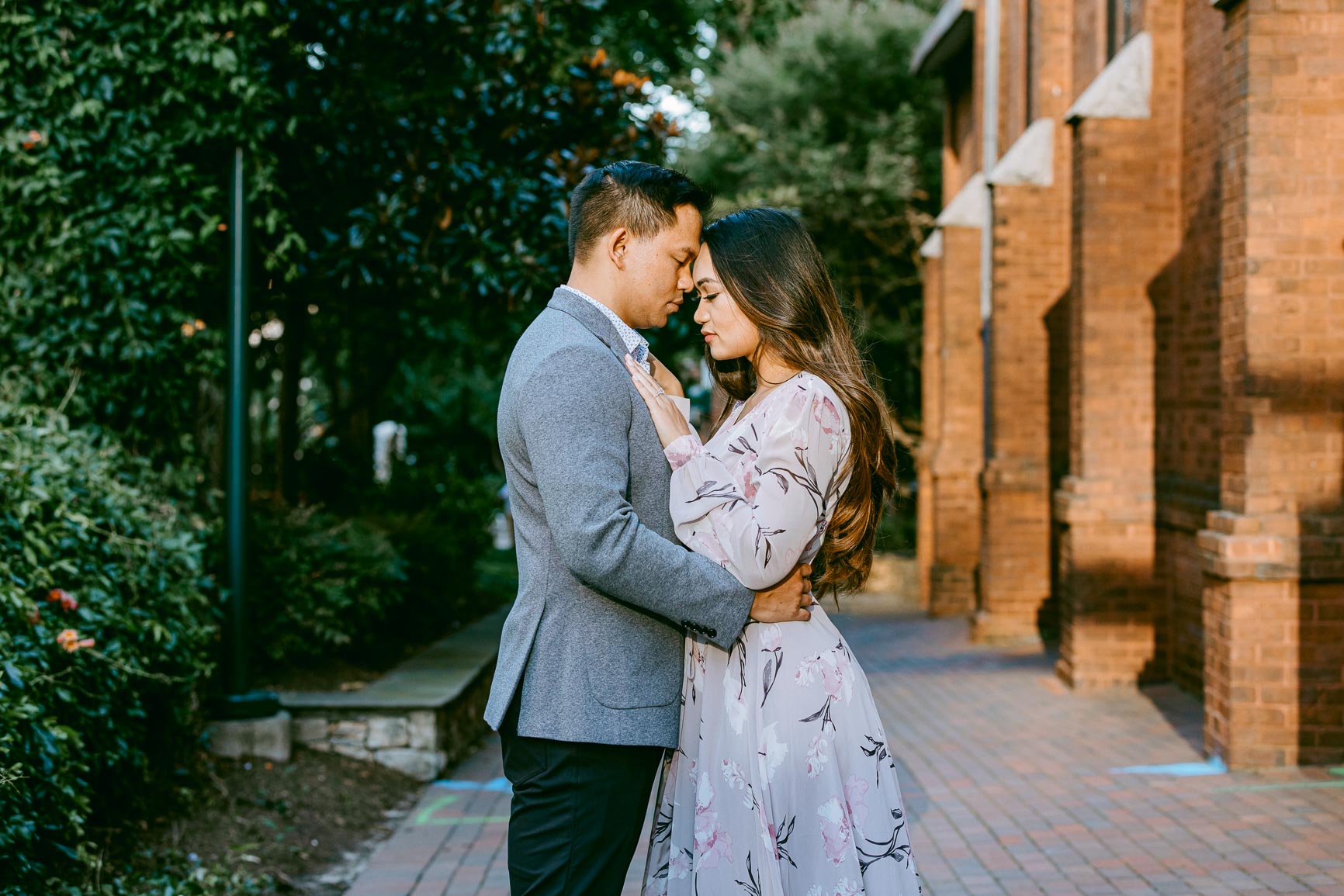 Uptown Charlotte engagement session at The Green shot by Nhieu Tang Photography | nhieutang.com