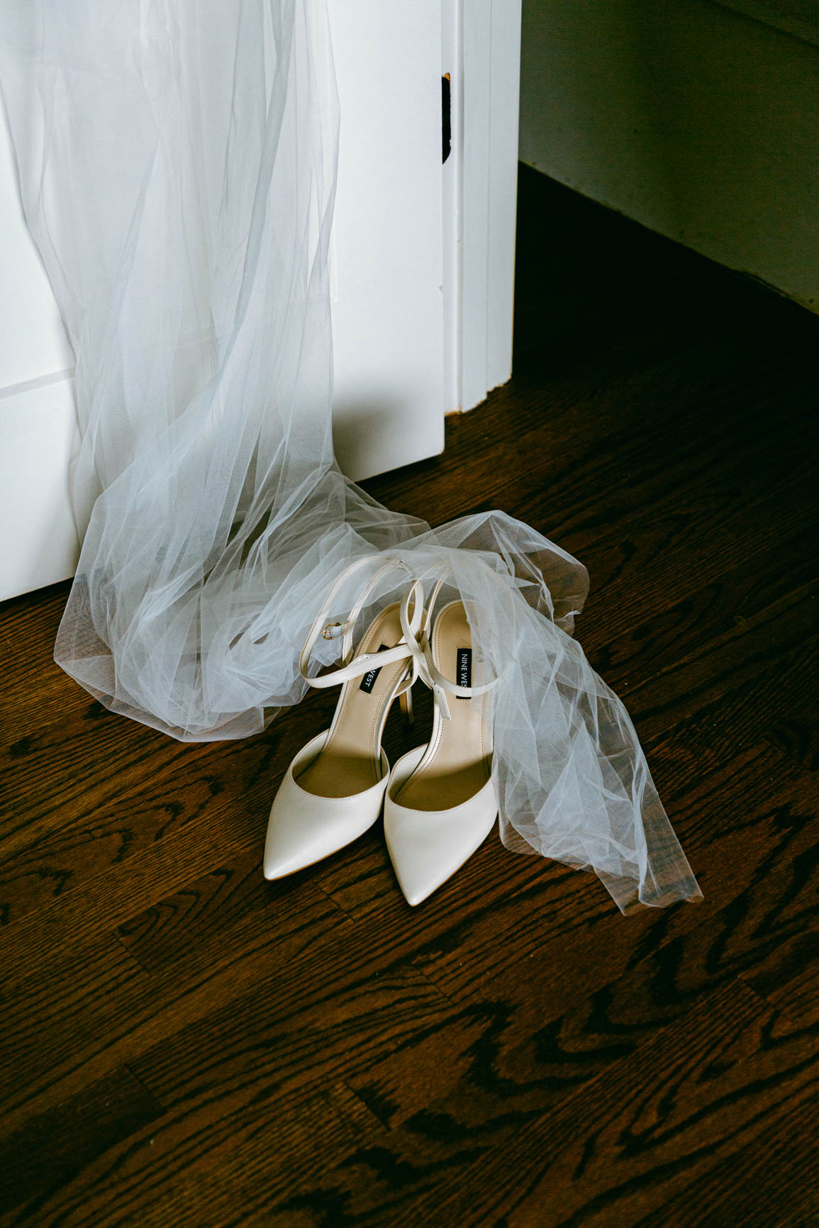 bride shoes from lake house elopement shot by Nhieu Tang Photography | nhieutang.com