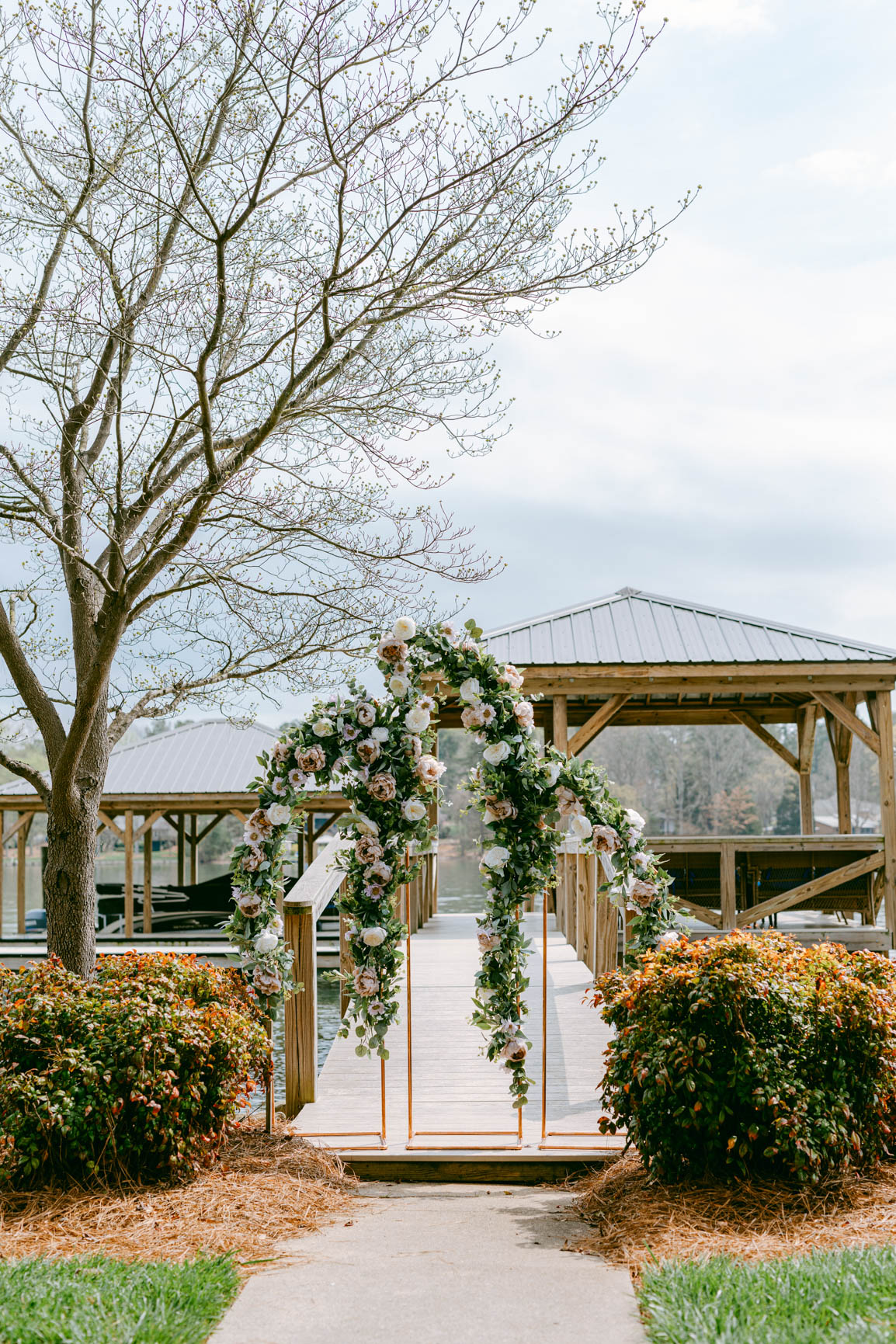 Lake house elopement on dock at Mooresville, NC shot by Nhieu Tang Photography | nhieutang.com