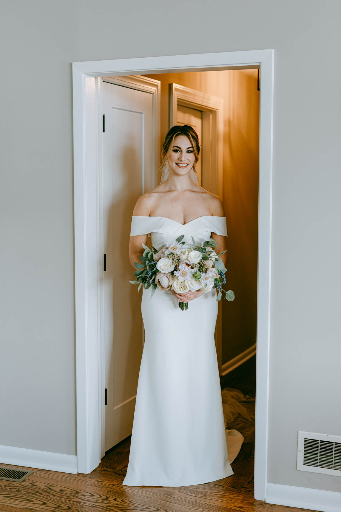 bride ready for a first look in Morrisville lake house shot by Nhieu Tang Photography | nhieutang.com
