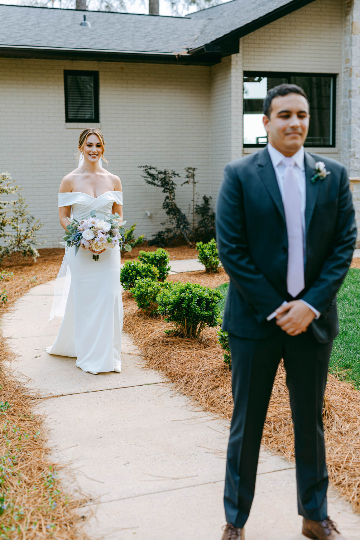 bride walking up to the groom for a first look in Mooresville, NC