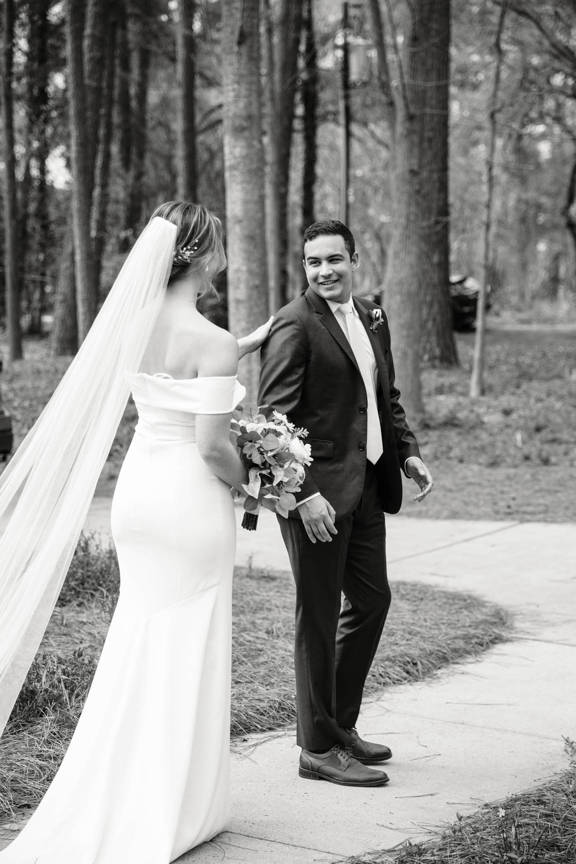 couple’s first look in Mooresville, NC lake house shot by Nhieu Tang Photography | nhieutang.com