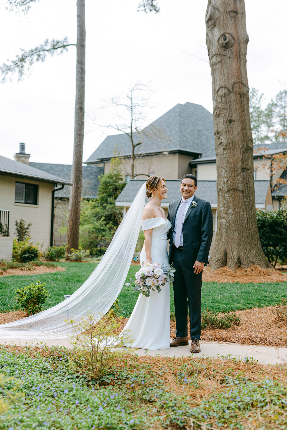 couple’s first look in Morrisville lake house shot by Nhieu Tang Photography | nhieutang.com