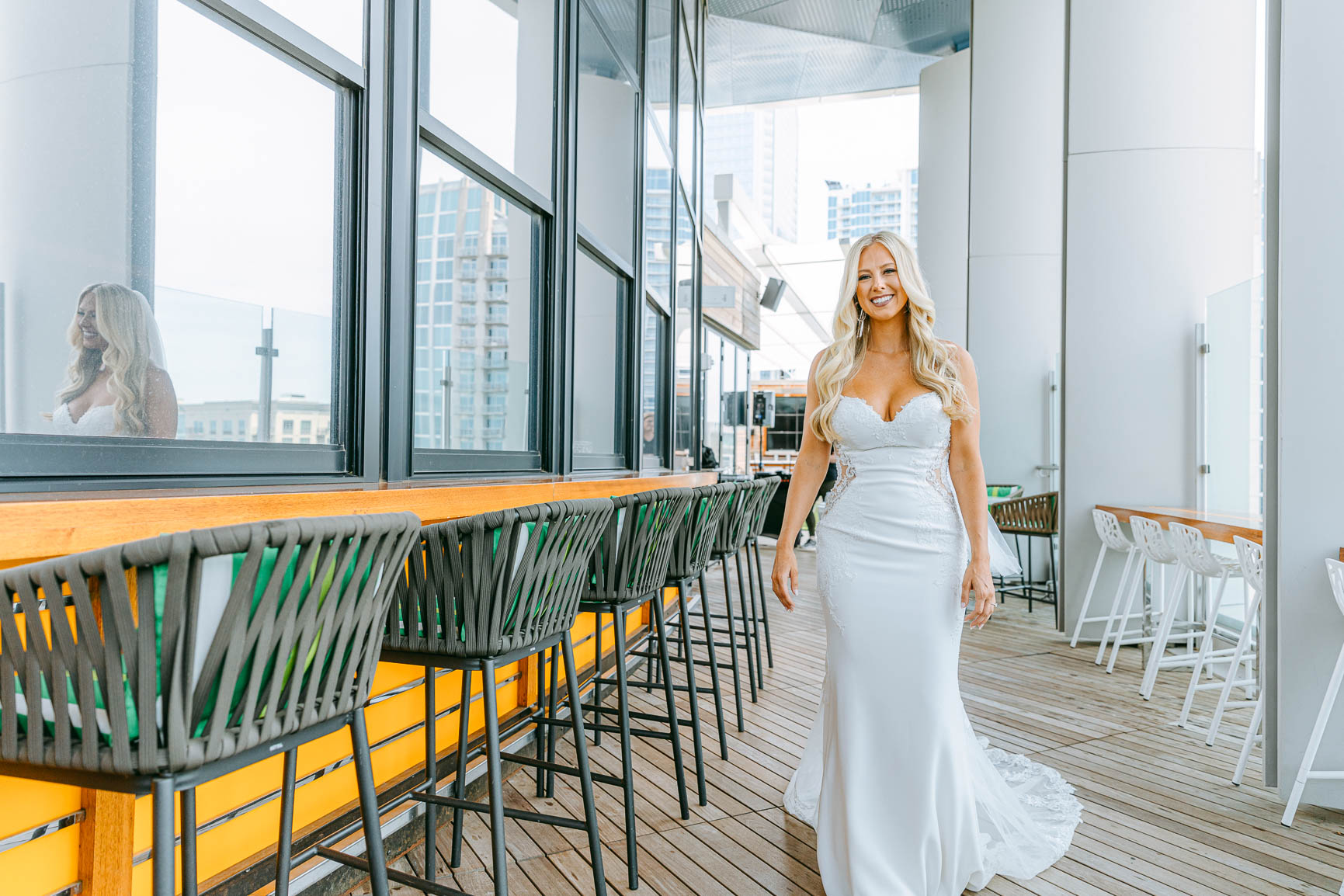 Bride and groom first look at merchant & trade rooftop in Charlotte nc shot by Nhieu Tang Photography | nhieutang.com