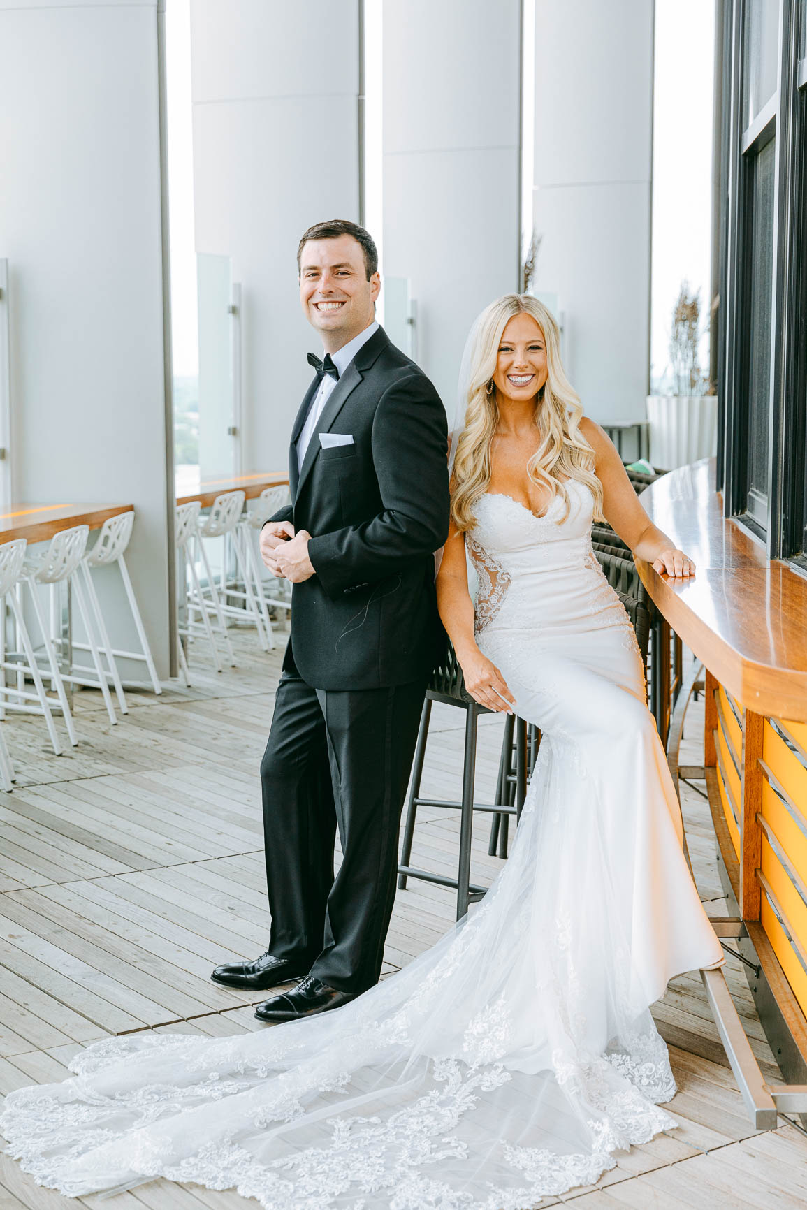 Bride and groom photos at merchant & trade rooftop in Charlotte nc shot by Nhieu Tang Photography | nhieutang.com