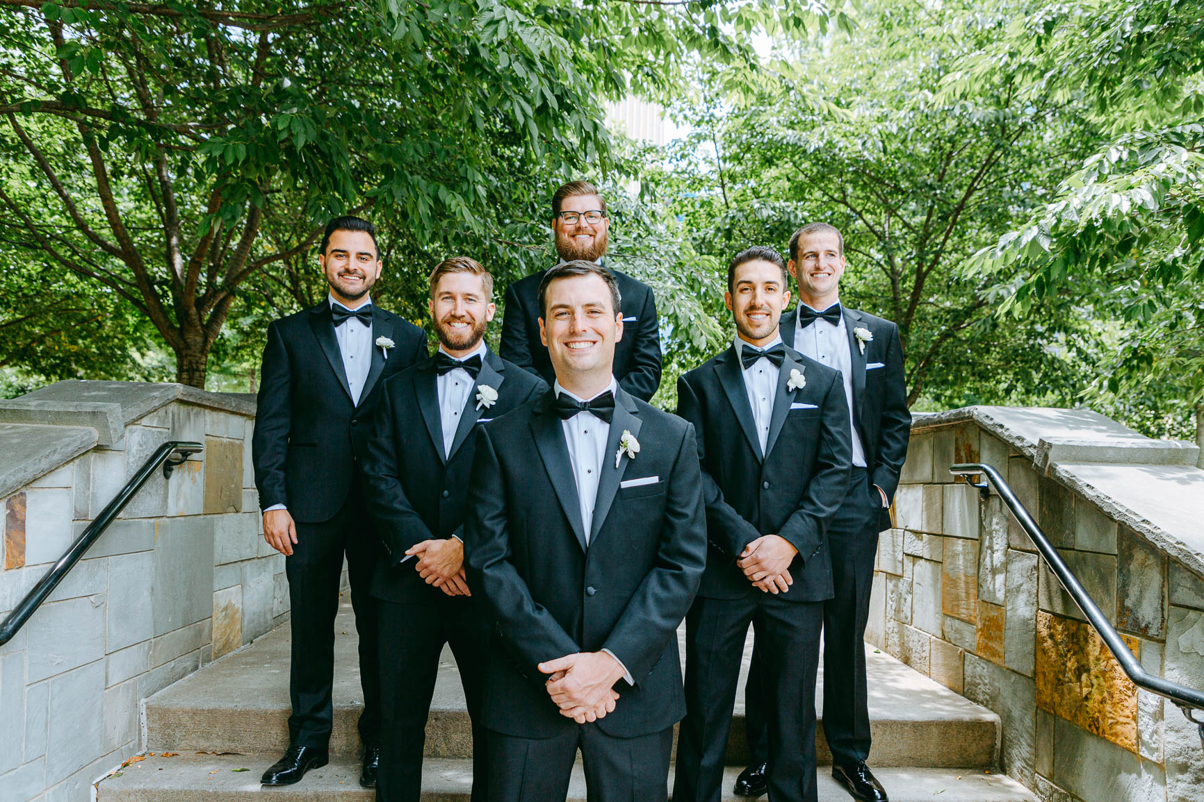 groom and groomsmen photos in uptown Charlotte nc shot by Nhieu Tang Photography | nhieutang.com