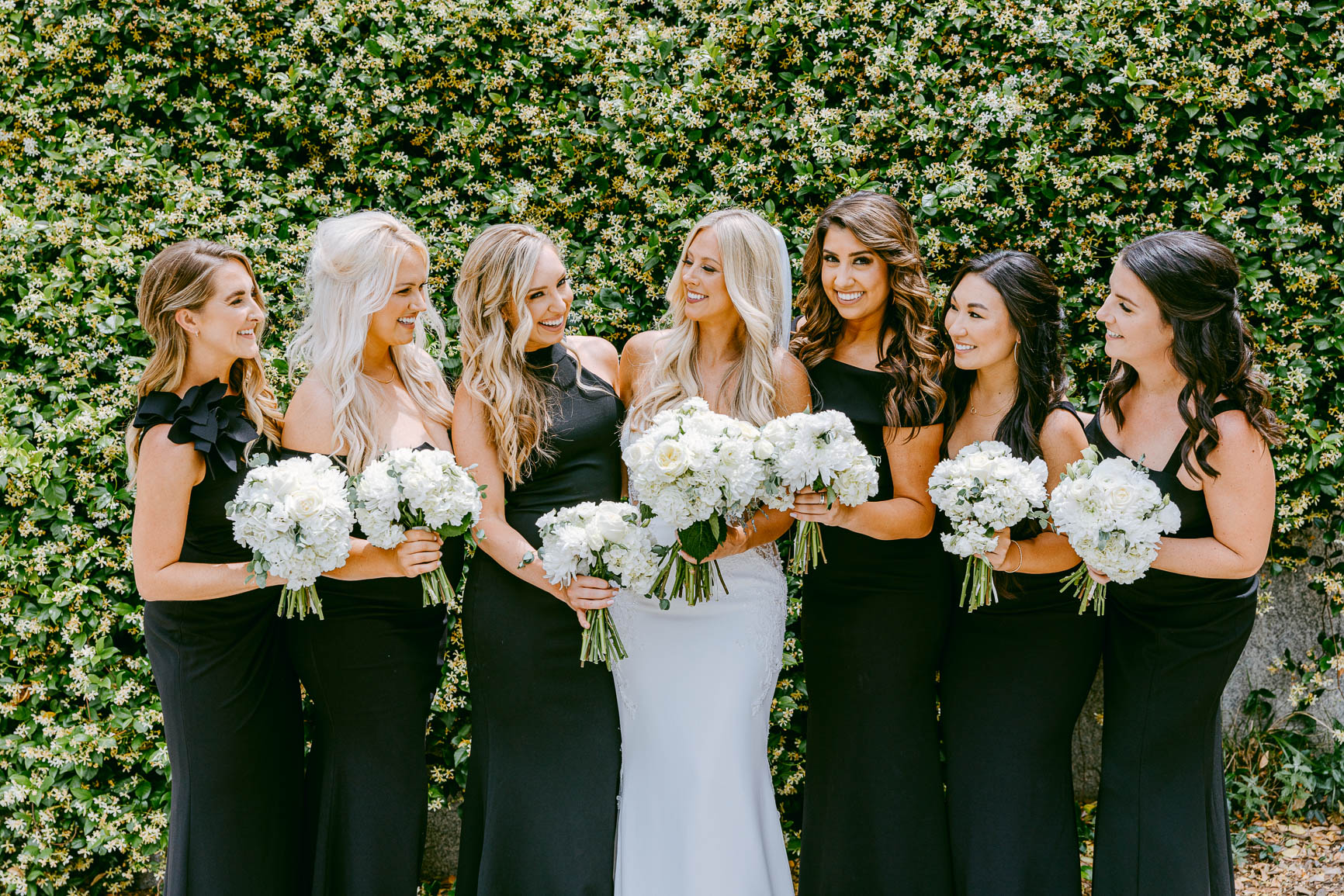 classic bride and bridesmaid photos in uptown Charlotte nc shot by Nhieu Tang Photography | nhieutang.com