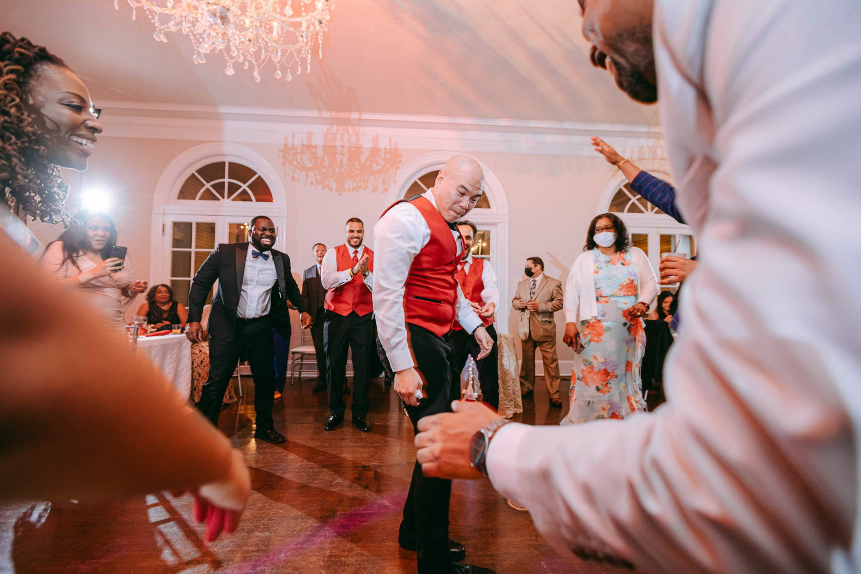 groom bust a move at Separk Mansion in Gastonia NC shot by Nhieu Tang Photography | nhieutang.com