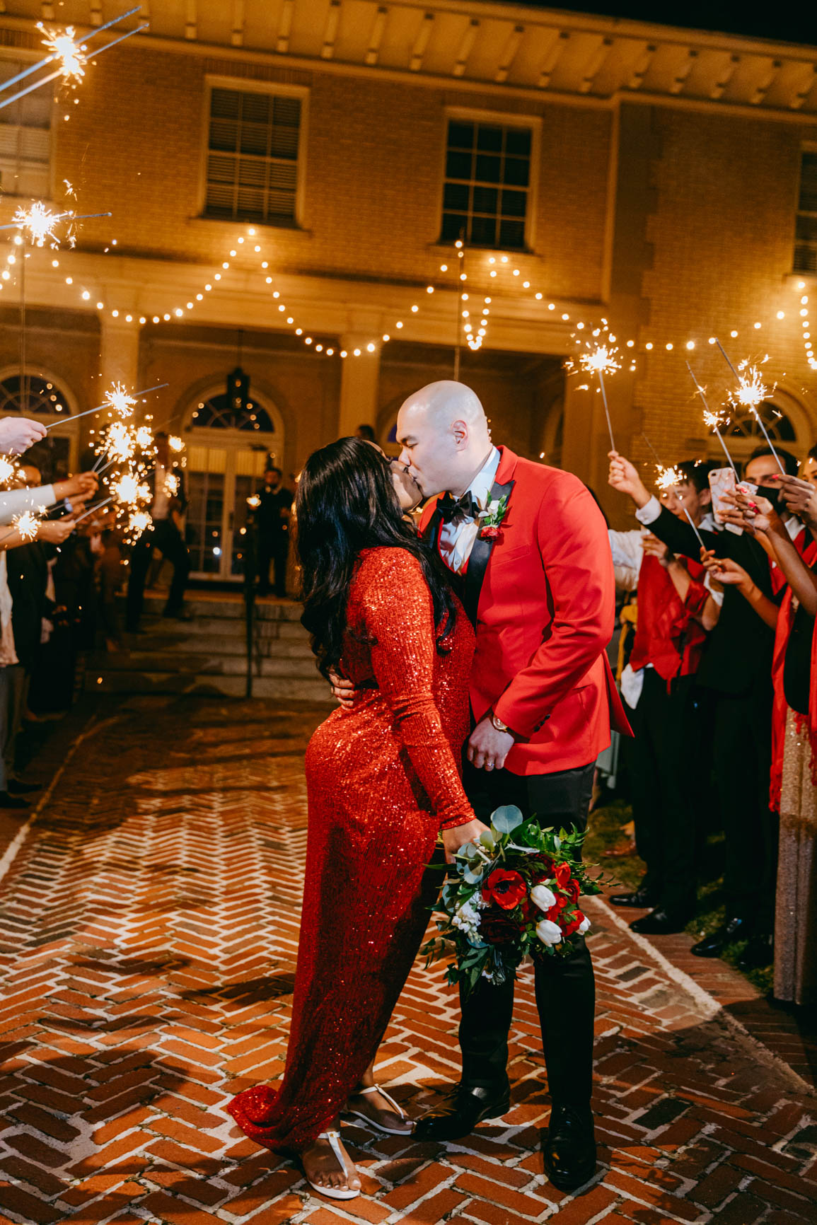 couple kiss during exit at Separk Mansion in Gastonia NC shot by Nhieu Tang Photography | nhieutang.com