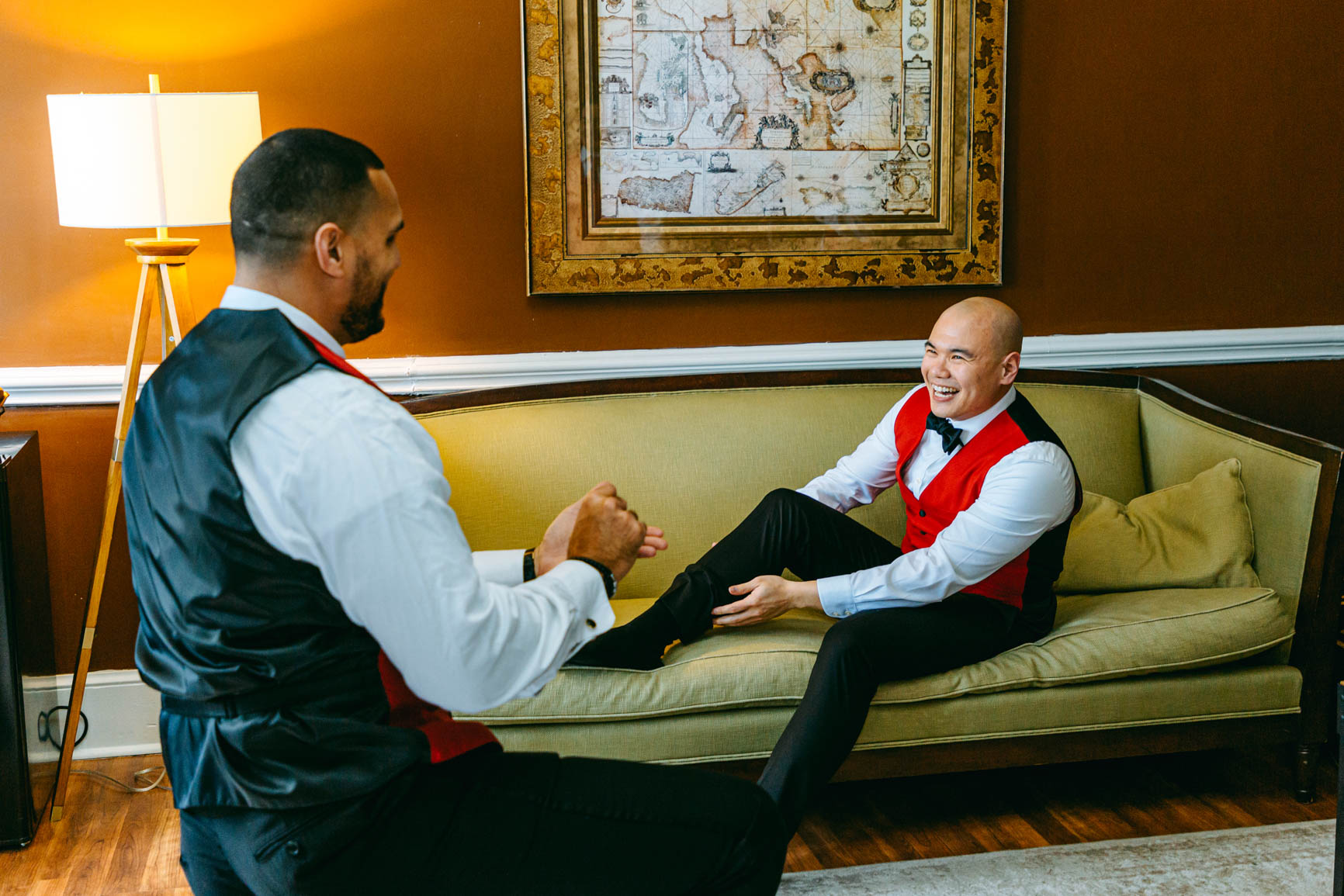 groom and best man laughing at Separk Mansion in Gastonia NC shot by Nhieu Tang Photography | nhieutang.com