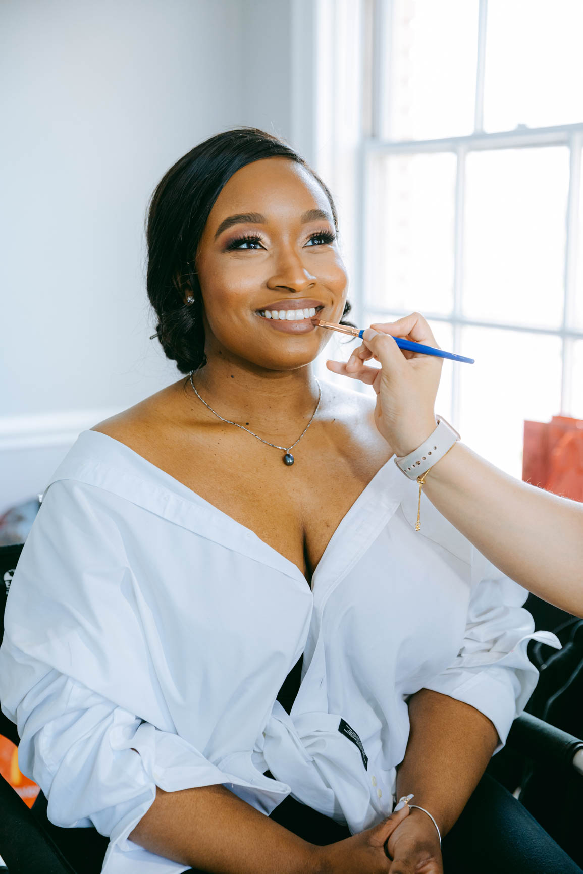 applying lipstick on bride at Separk Mansion in Gastonia NC shot by Nhieu Tang Photography | nhieutang.com