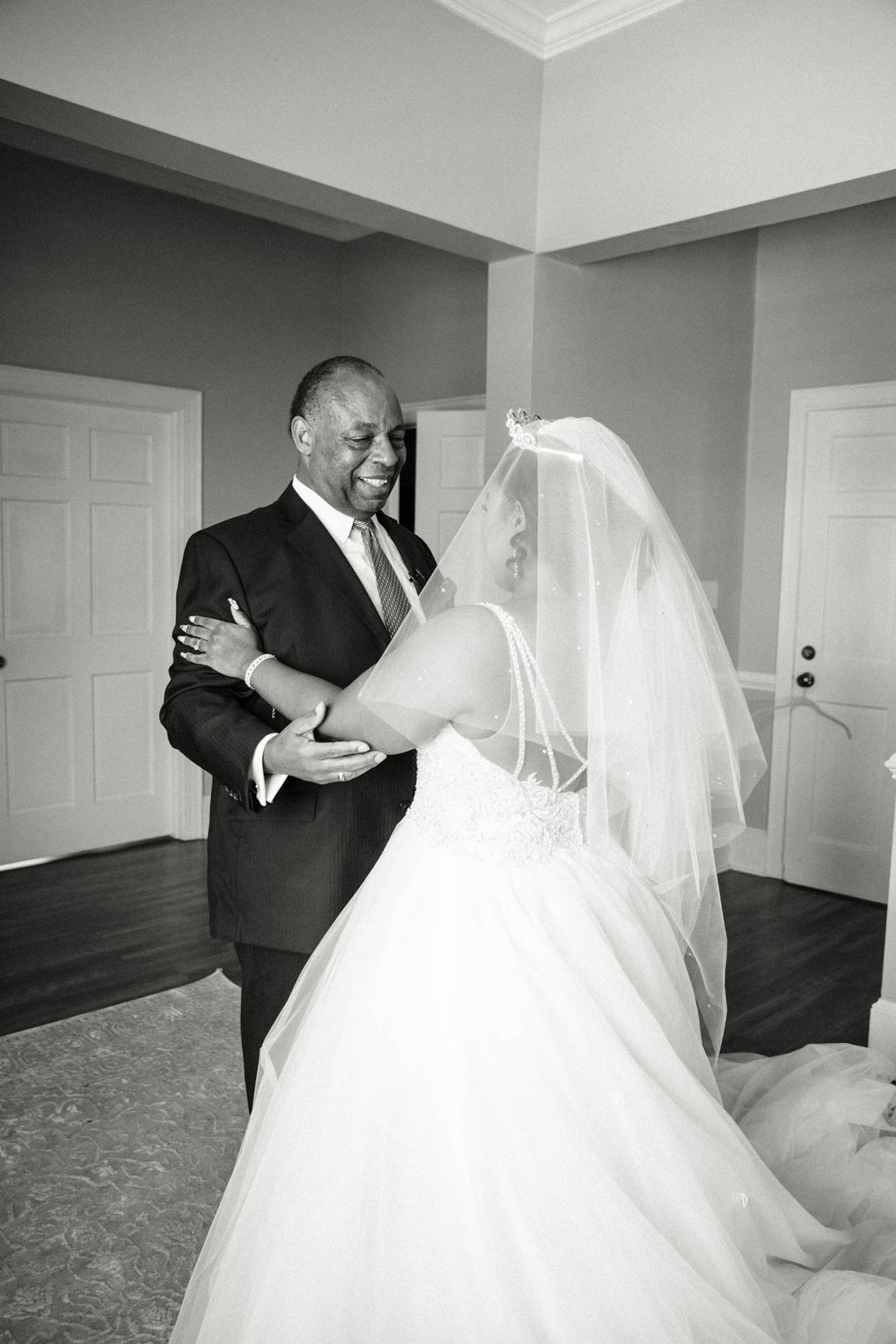 bride and father first look at Separk Mansion in Gastonia NC shot by Nhieu Tang Photography | nhieutang.com